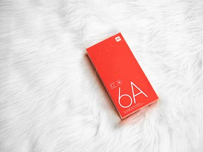 Cách đóng hộp của Redmi 6A khá quen thuộc với tông màu cam logo trắng.